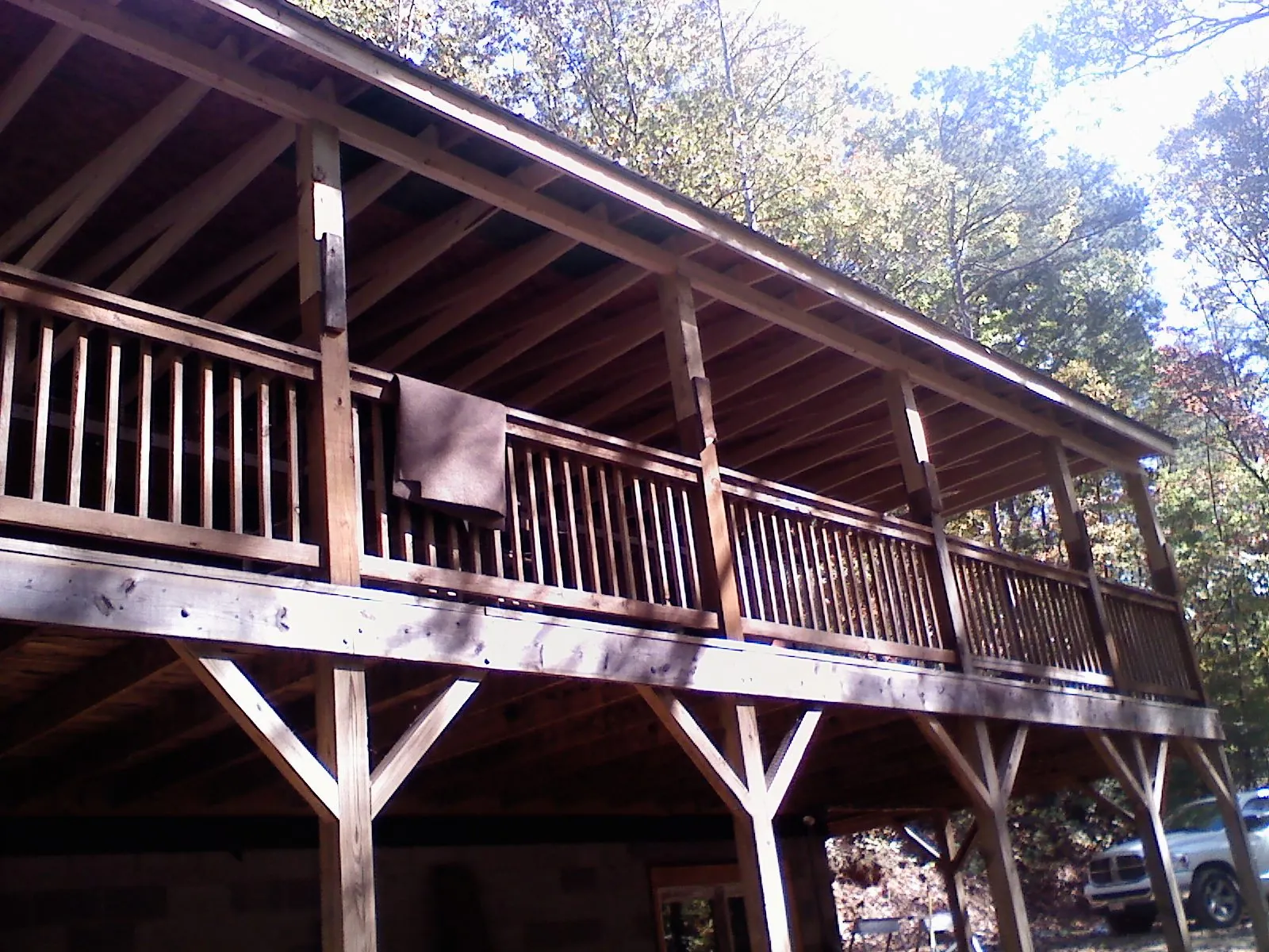Timber framing under a new elevated porch and deck — Roof Leak Repair in Deer Grove by Roofing Brothers